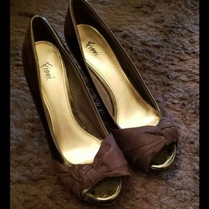 Black high heels with peep toe